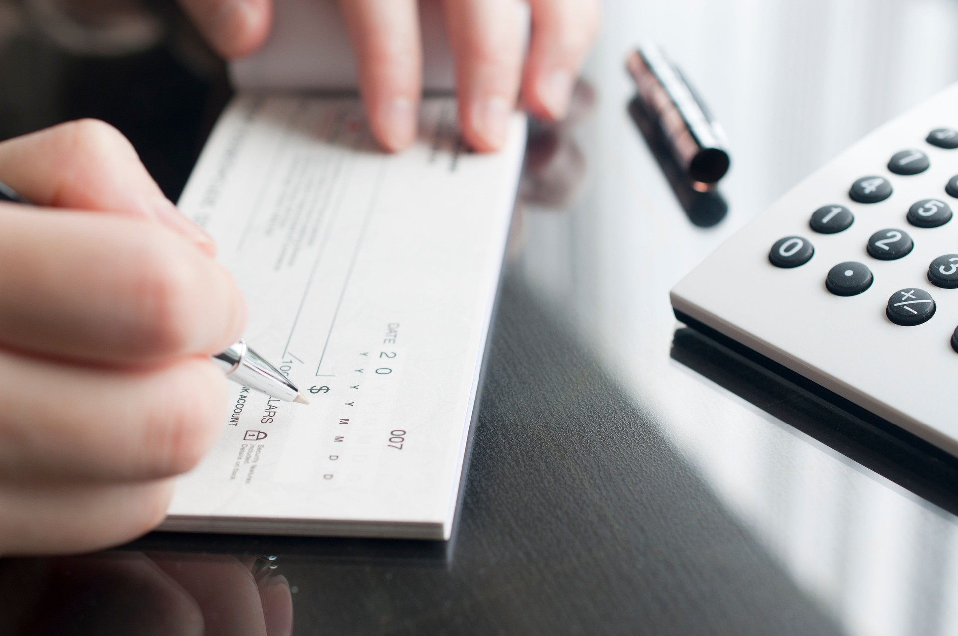 Business woman prepare writing a check